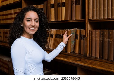 Student researching in a library